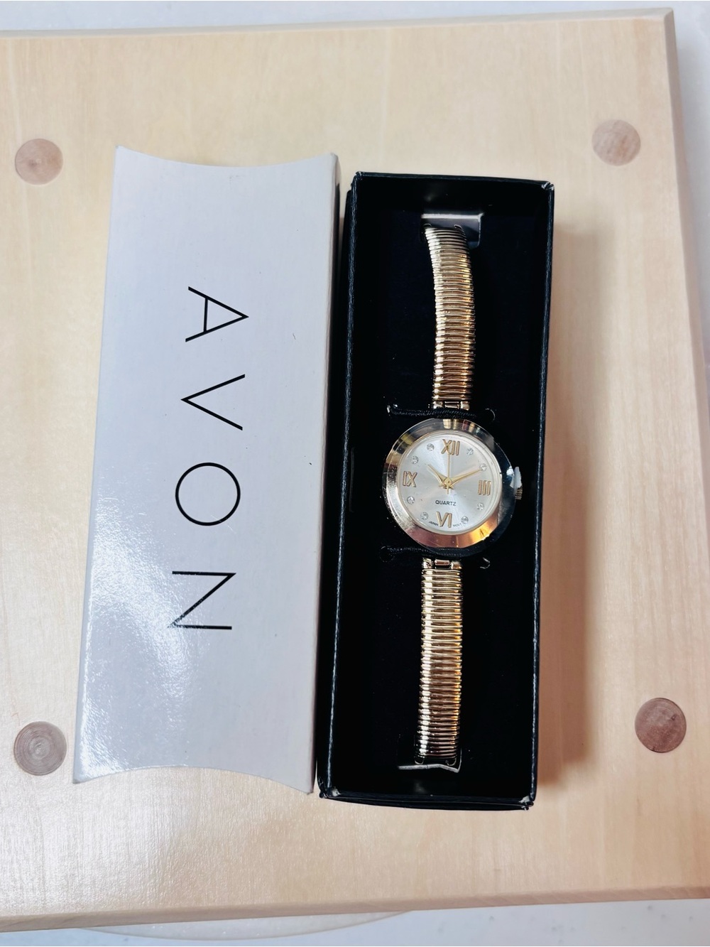 Avon Gold-Tone Women's Stretch Bracelet Watch with crystal accents